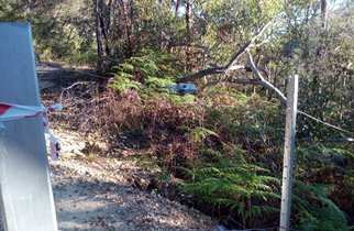 Wire and Star Pickets around gate in danger zone