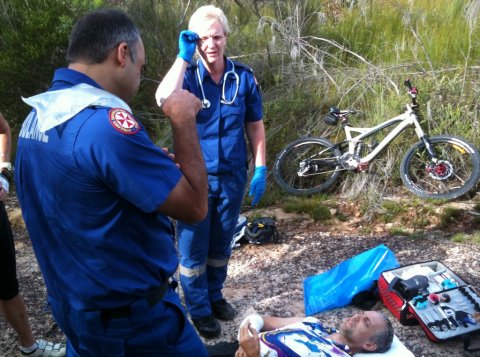 Dibbler down: Ambo's calling for back up, administering morphine.