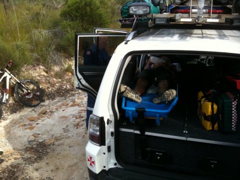 Dibbler on stretcher in Subaru 4WD Ambulance - note the feet! (tight fit)